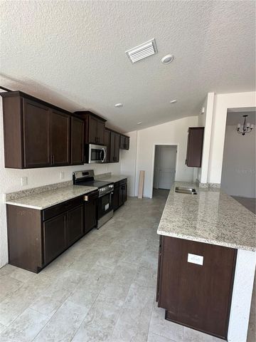 12555 NE 48TH TERR, Oxford, FL 34484