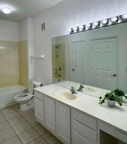 6335 CONTESSA DRIVE 104, Orlando, FL 32829