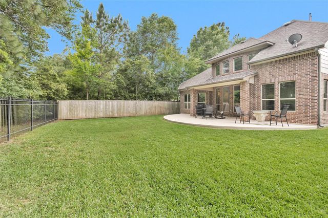 106 Cliftons Curve Way, Montgomery, TX 77316