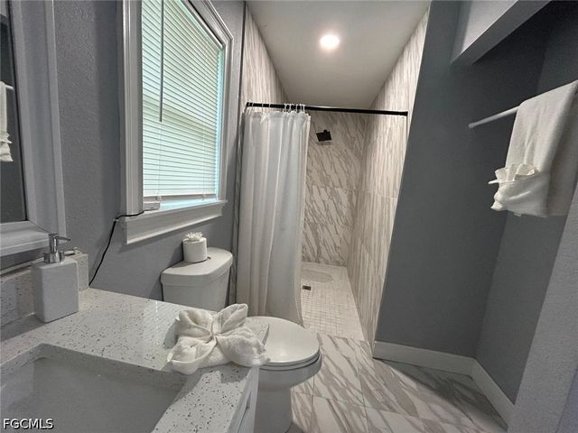 3413 2nd ST SW, Lehigh Acres, FL 33976