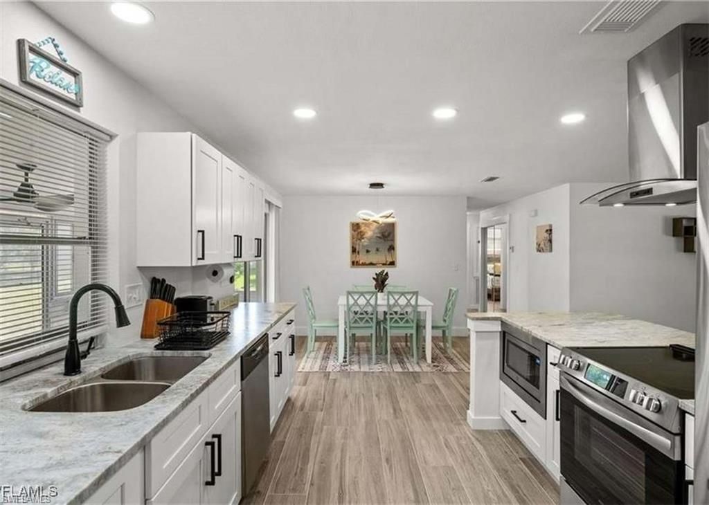 223 SE 45th ST, CAPE CORAL, FL 33904 — photo 3