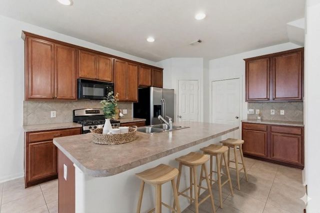 19 Aquiline Oaks Place, The Woodlands, TX 77382