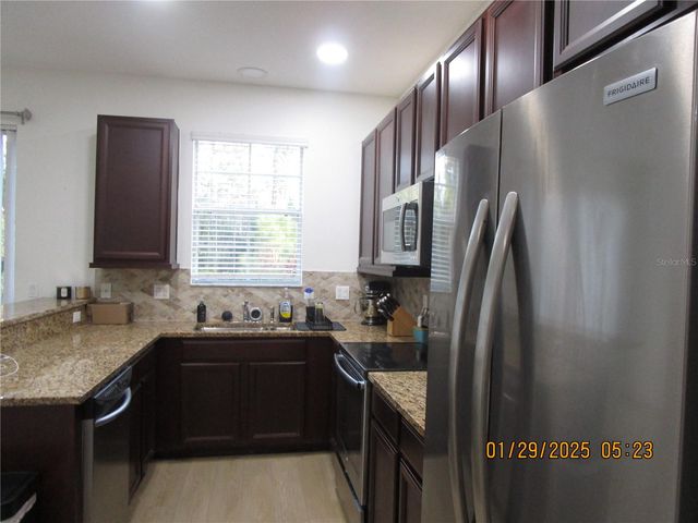 9241 SWEET MAPLE AVENUE, Orlando, FL 32832