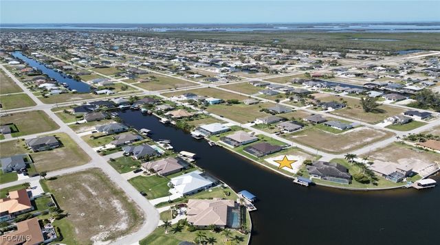 909 NW 36th PL, Cape Coral, FL 33993