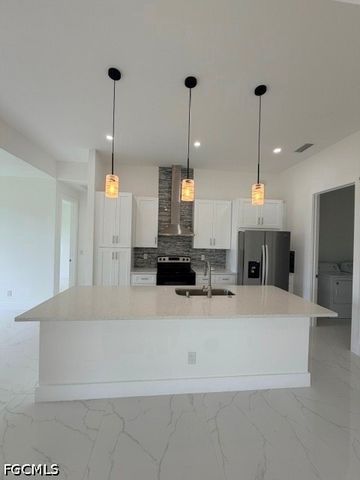 2124 NE 28th ST, Cape Coral, FL 33909