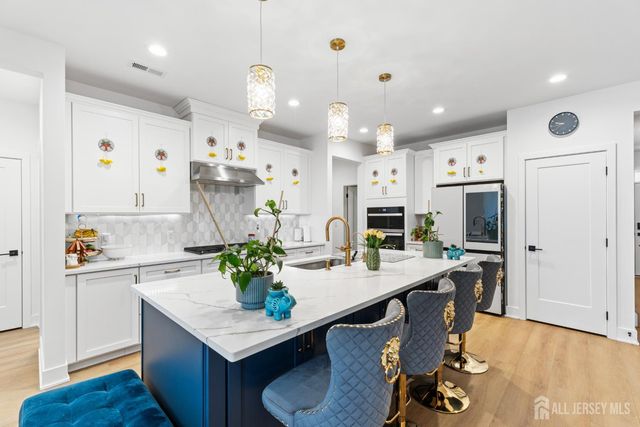 77 Mustang Drive, Manalapan, NJ 07726