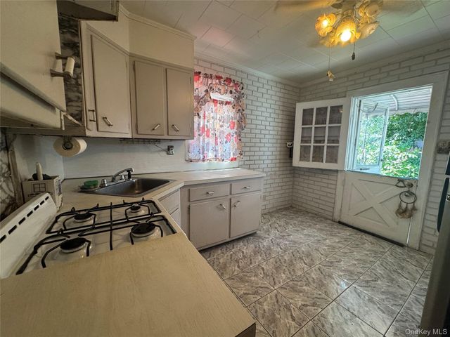 104-29 37th Drive, Corona, NY 11368