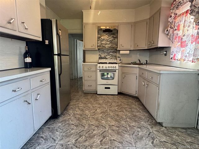 104-29 37th Drive, Corona, NY 11368