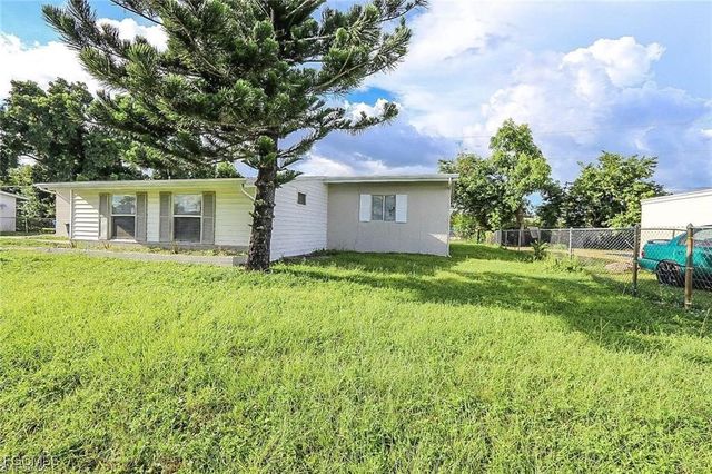 305 Bougainvillea RD W, Lehigh Acres, FL 33936