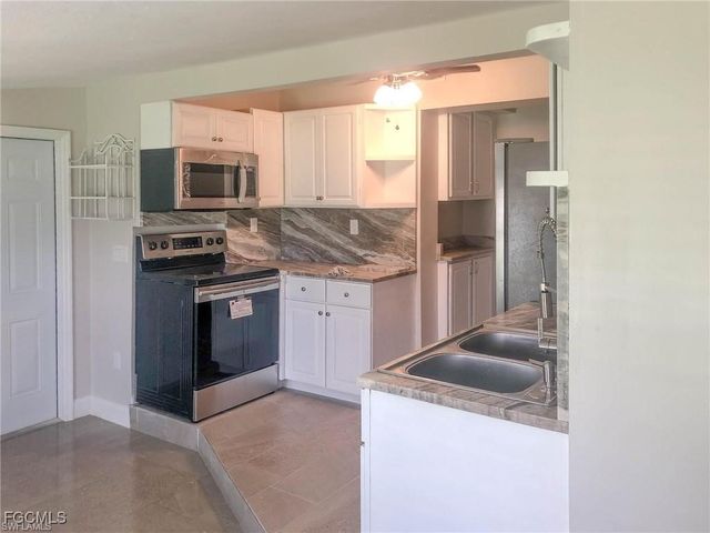 305 Bougainvillea RD W, Lehigh Acres, FL 33936