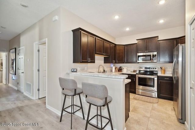 590 Remington Green Drive SE, 104, Palm Bay, FL 32909