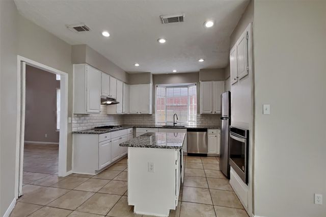 7918 Hidden Oaks Lane, Houston, TX 77095