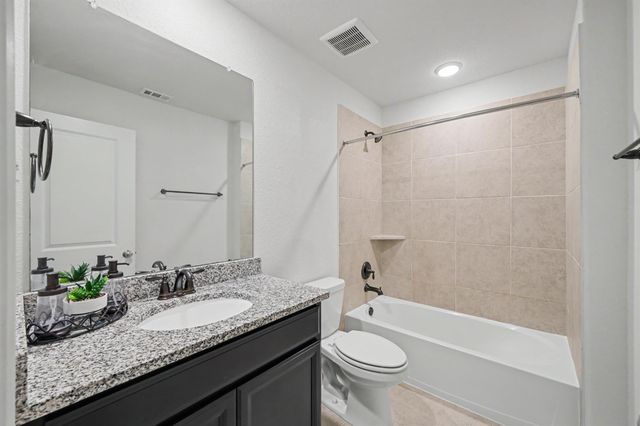 11931 Bazley Knoll Drive, Humble, TX 77346