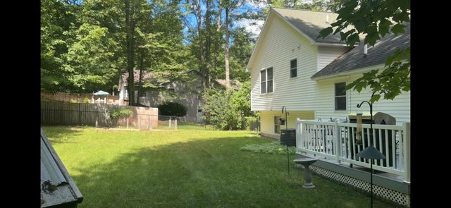 8450 Bent Pine Drive, Almira Twp, MI 49650