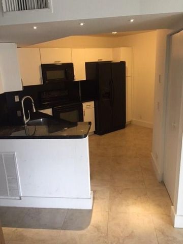 8761 Wiles Rd 103, Coral Springs, FL 33067