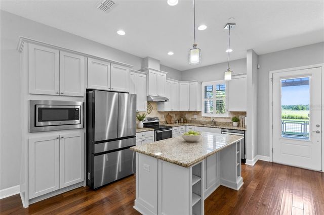 8120 TAVISTOCK LAKES BOULEVARD, Orlando, FL 32827