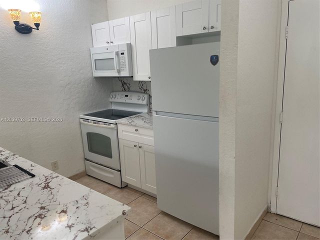 2401 Riverside Drive 203B, Coral Springs, FL 33065
