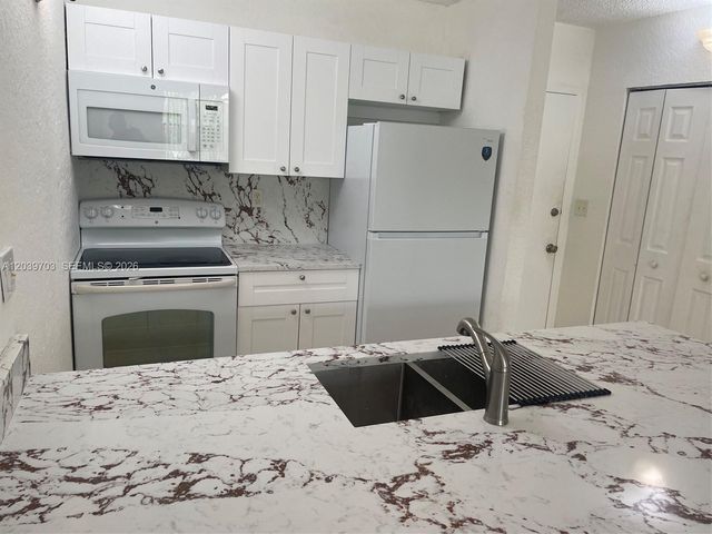 2401 Riverside Drive 203B, Coral Springs, FL 33065