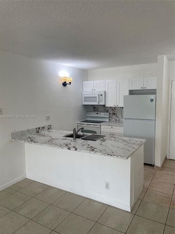2401 Riverside Drive 203B, Coral Springs, FL 33065
