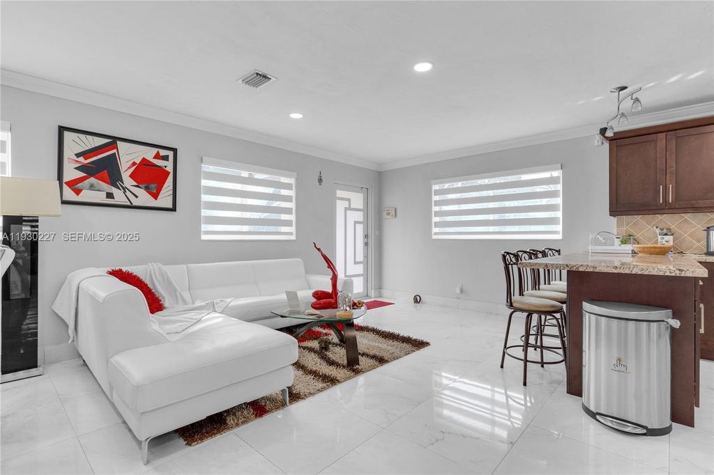 Image 6 of property listing at 11051 SW 69th Dr, Miami, FL 33173