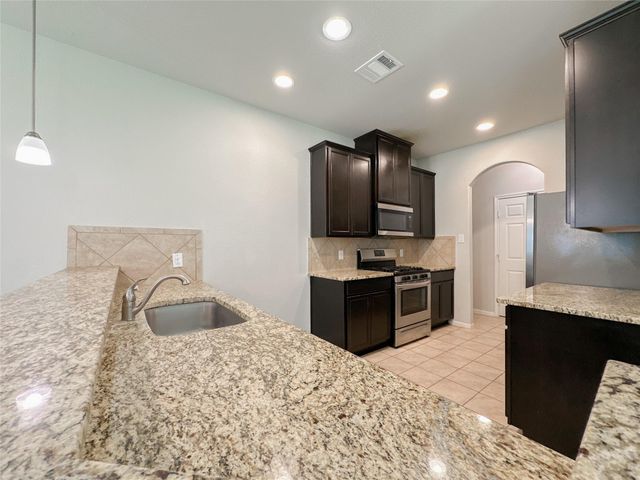 105 Camelot Place Court, Conroe, TX 77304