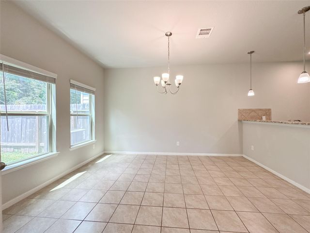 105 Camelot Place Court, Conroe, TX 77304