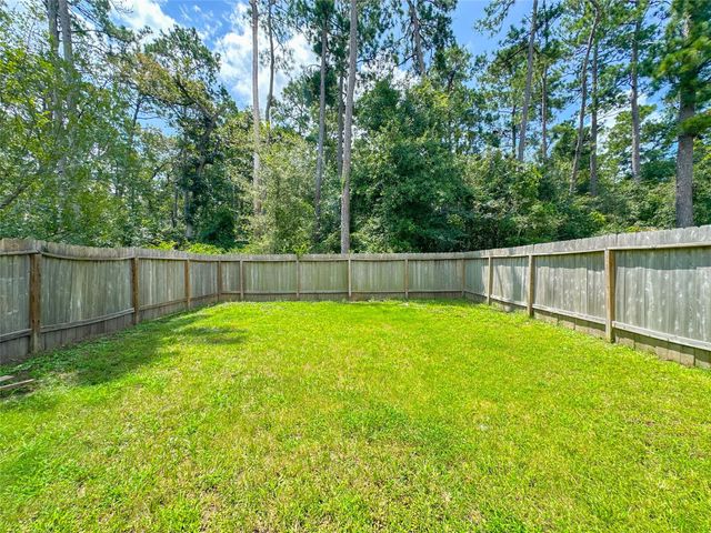 105 Camelot Place Court, Conroe, TX 77304