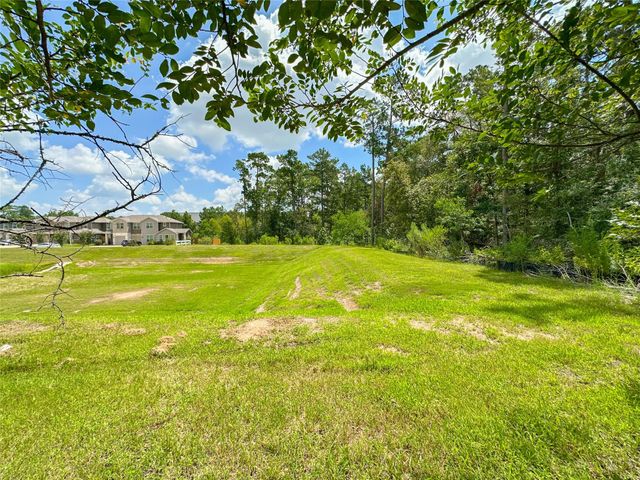 105 Camelot Place Court, Conroe, TX 77304
