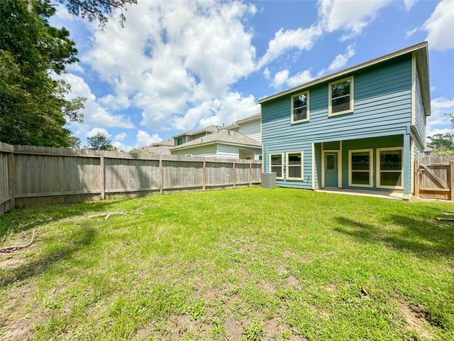 105 Camelot Place Court, Conroe, TX 77304
