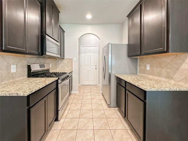 105 Camelot Place Court, Conroe, TX 77304