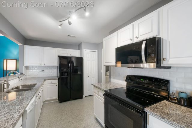 16524 Radison Drive, Macomb Township, MI 48044