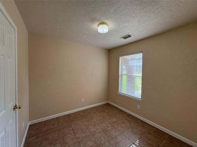 14129 Broken Arrow Drive, Willis, TX 77378