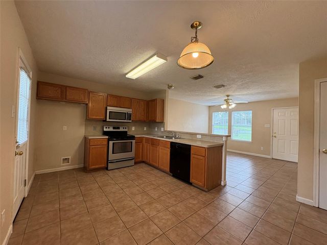 14129 Broken Arrow Drive, Willis, TX 77378