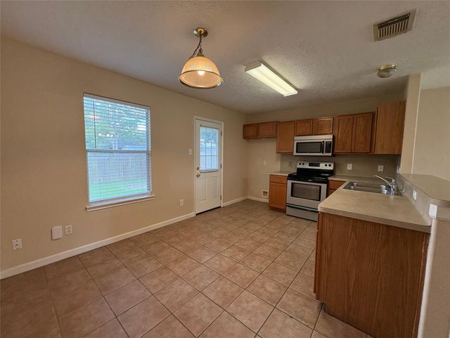 14129 Broken Arrow Drive, Willis, TX 77378