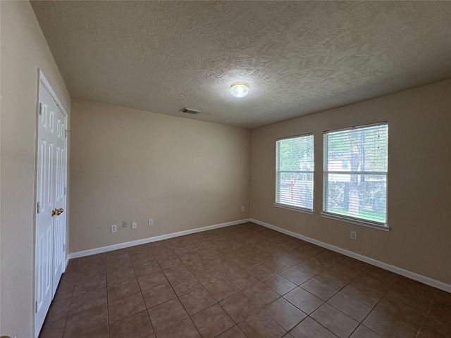 14129 Broken Arrow Drive, Willis, TX 77378