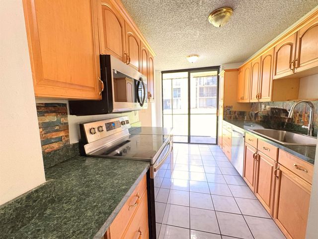 3590 Blue Lake Drive 104, Pompano Beach, FL 33064
