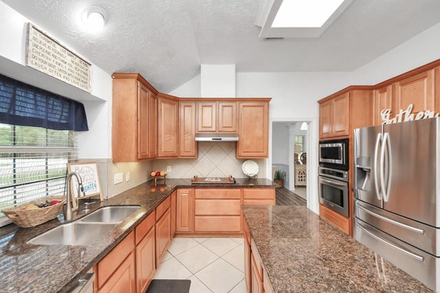 5231 S Fm 565 Road, Cove, TX 77523