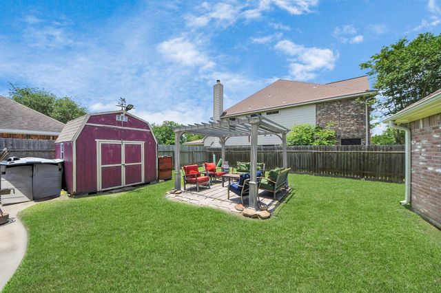 5231 S Fm 565 Road, Cove, TX 77523