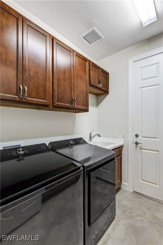 7611 Winding Cypress DR, Naples, FL 34114