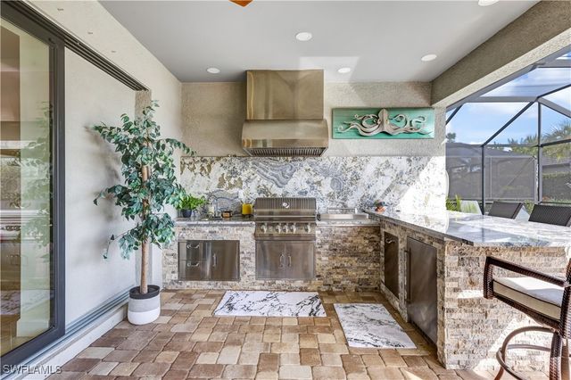 7611 Winding Cypress DR, Naples, FL 34114