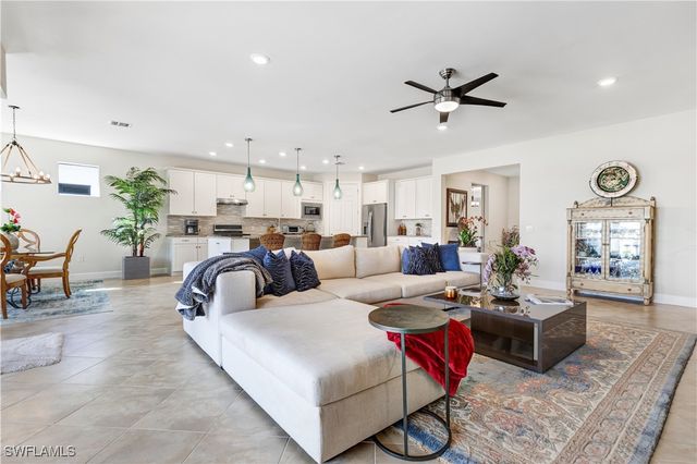 7611 Winding Cypress DR, Naples, FL 34114