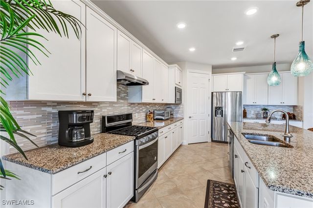 7611 Winding Cypress DR, Naples, FL 34114