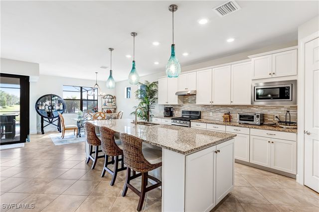 7611 Winding Cypress DR, Naples, FL 34114