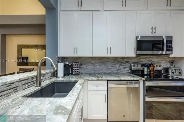 5754 NW 127th Ter, Coral Springs, FL 33076