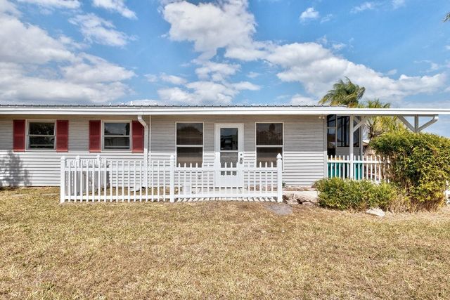 856 Periwinkle Circle, Barefoot Bay, FL 32976