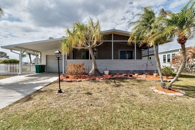856 Periwinkle Circle, Barefoot Bay, FL 32976
