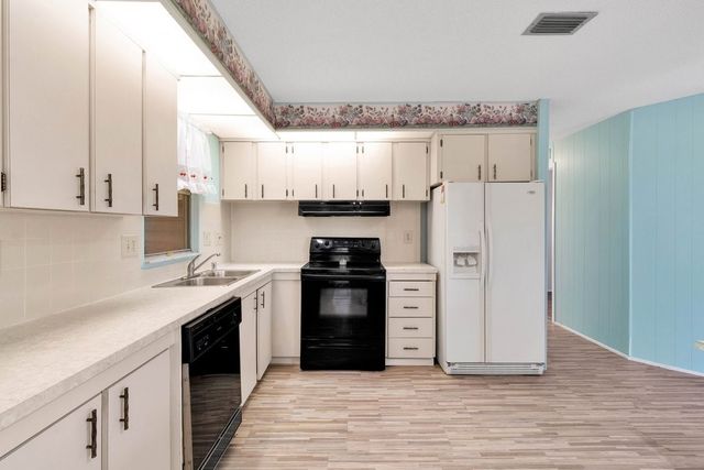 856 Periwinkle Circle, Barefoot Bay, FL 32976