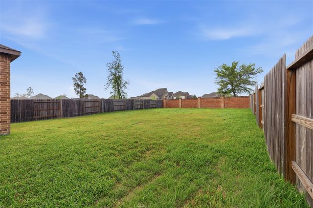 11910 Bazley Knoll Drive, Humble, TX 77346
