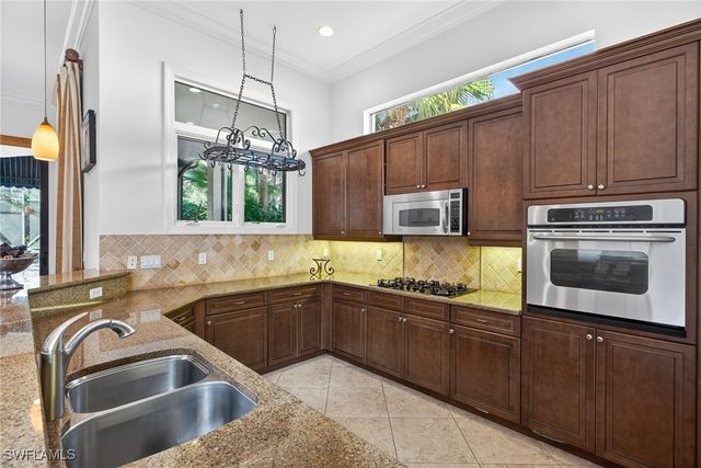 16838 CABREO DR, Naples, FL 34110