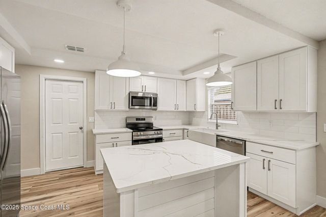 292 Pine Tree Drive, Indialantic, FL 32903